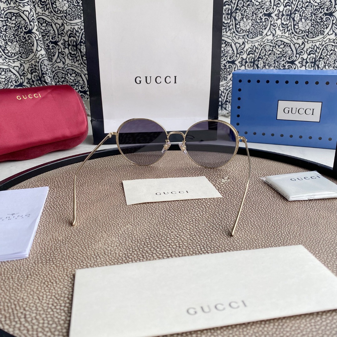 Chloé Eyewear engraved-logo round-frame sunglasses