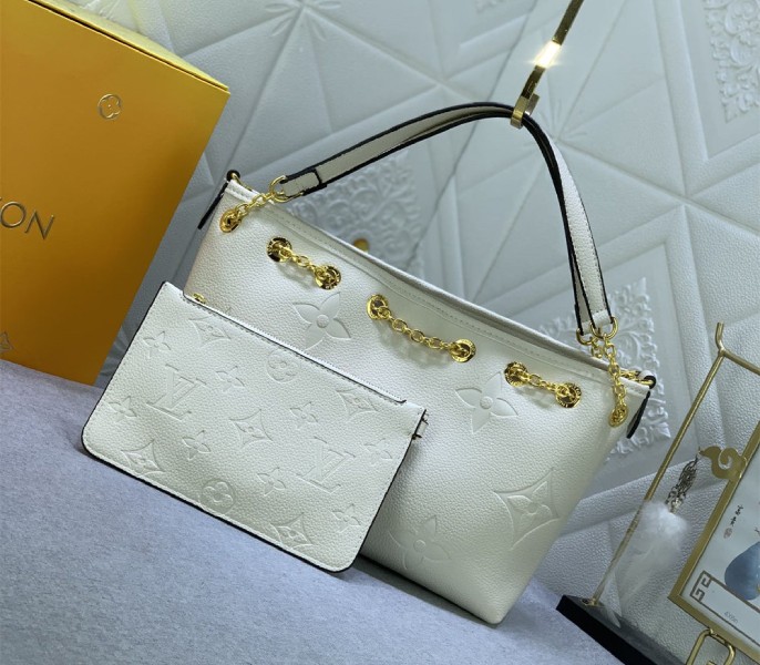 L0vis Vvtt0n Monogram Empreinte Leather Bundle Bag In Cream