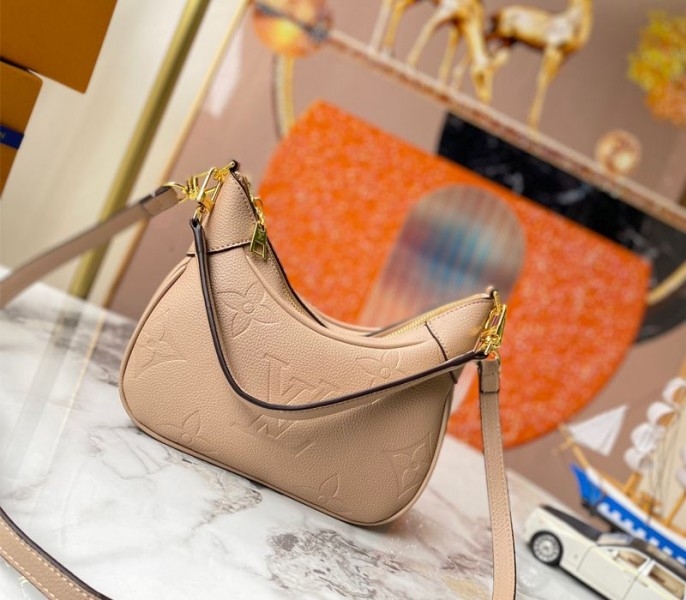 L0vis Vvtt0n Monogram Empreinte Leather Bagatelle Mini Hobo In Beige