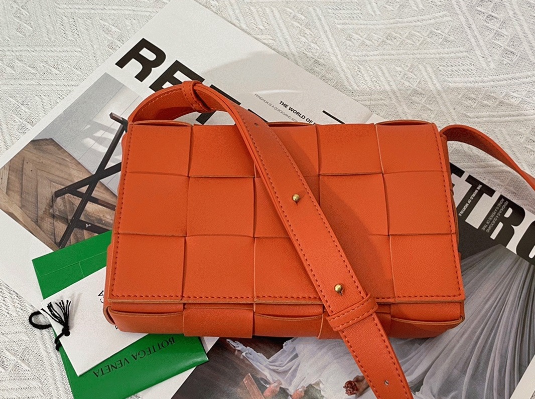 Top Quality Knockoff B0tt*ga Ven*ta Cassette Bag In Orange