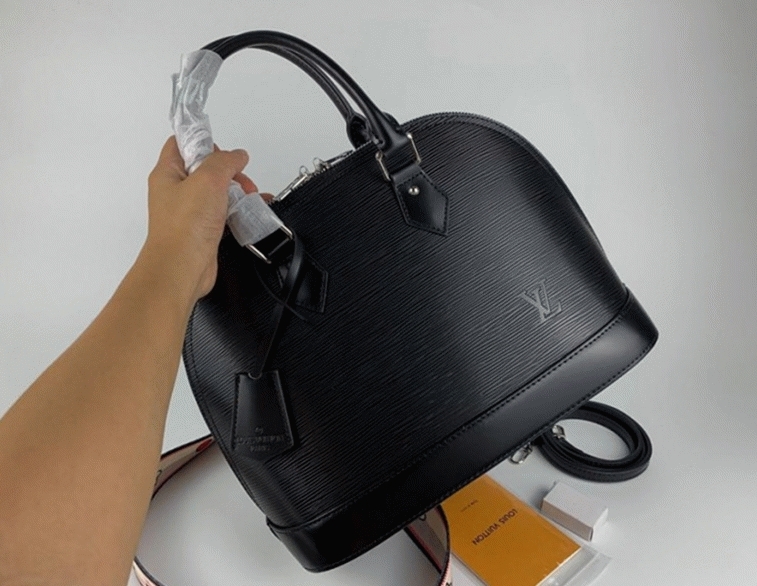 L0vis Vvtt0n Epi Leather Alma PM Jacquard Strap Handbag In Black