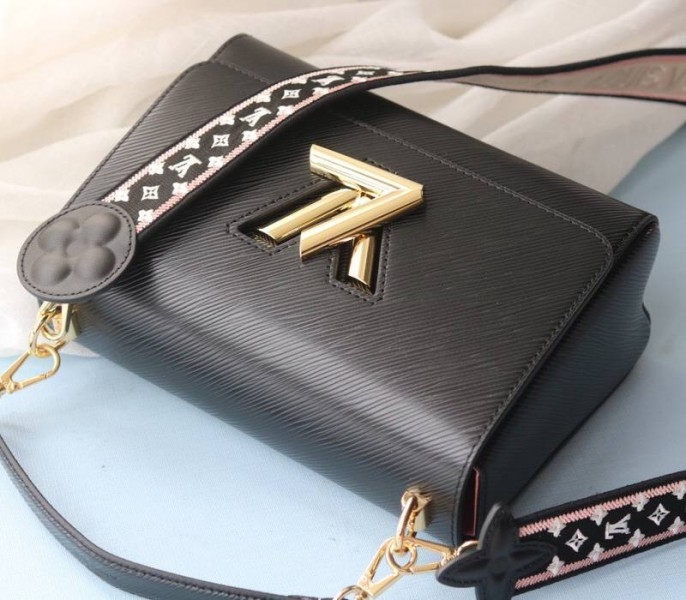 L0vis Vvtt0n Epi Leather Twist MM Handbag In Black With Embroidered Strap