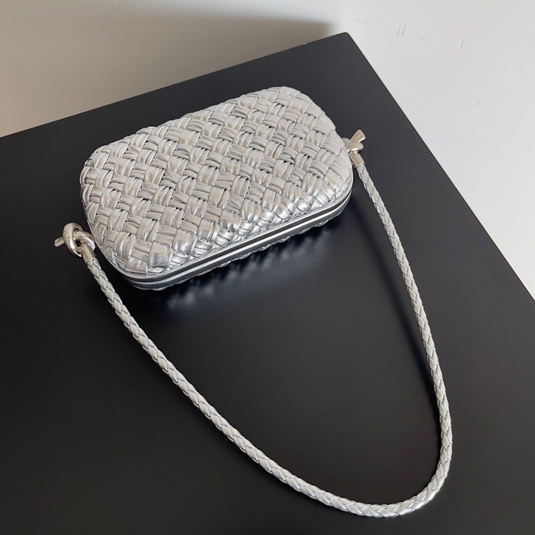Fake B0tt*ga Ven*ta Knot Minaudiere On Strap Silver Intreccio Laminated Leather