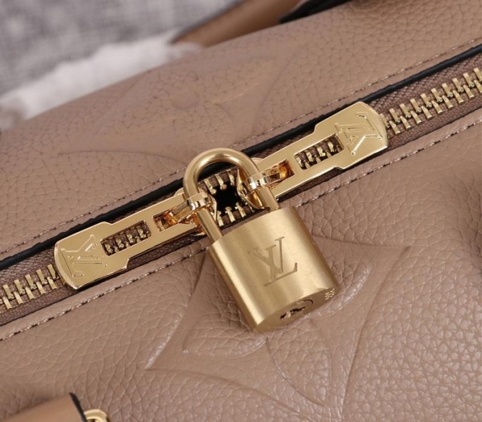 L0vis Vvtt0n Monogram Empreinte Leather Speedy Bandouliere 25 Handbag In Tourterelle Gray