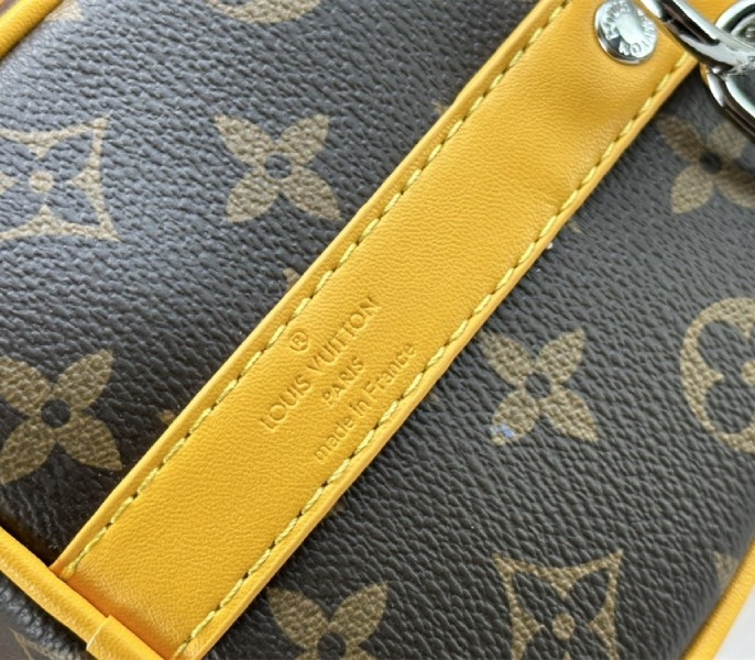 L0vis Vvtt0n Monogram Macassar Canvas Keepall Bandouliere 25 In Safran Yellow