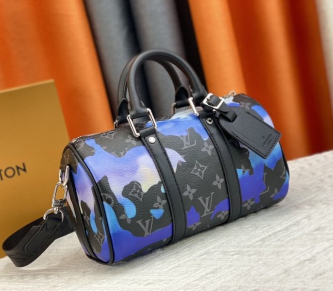 L0vis Vvtt0n Monogram Eclipse Keepall Bandouliere 25 Travel Bag In Blue And Purple Sunrise