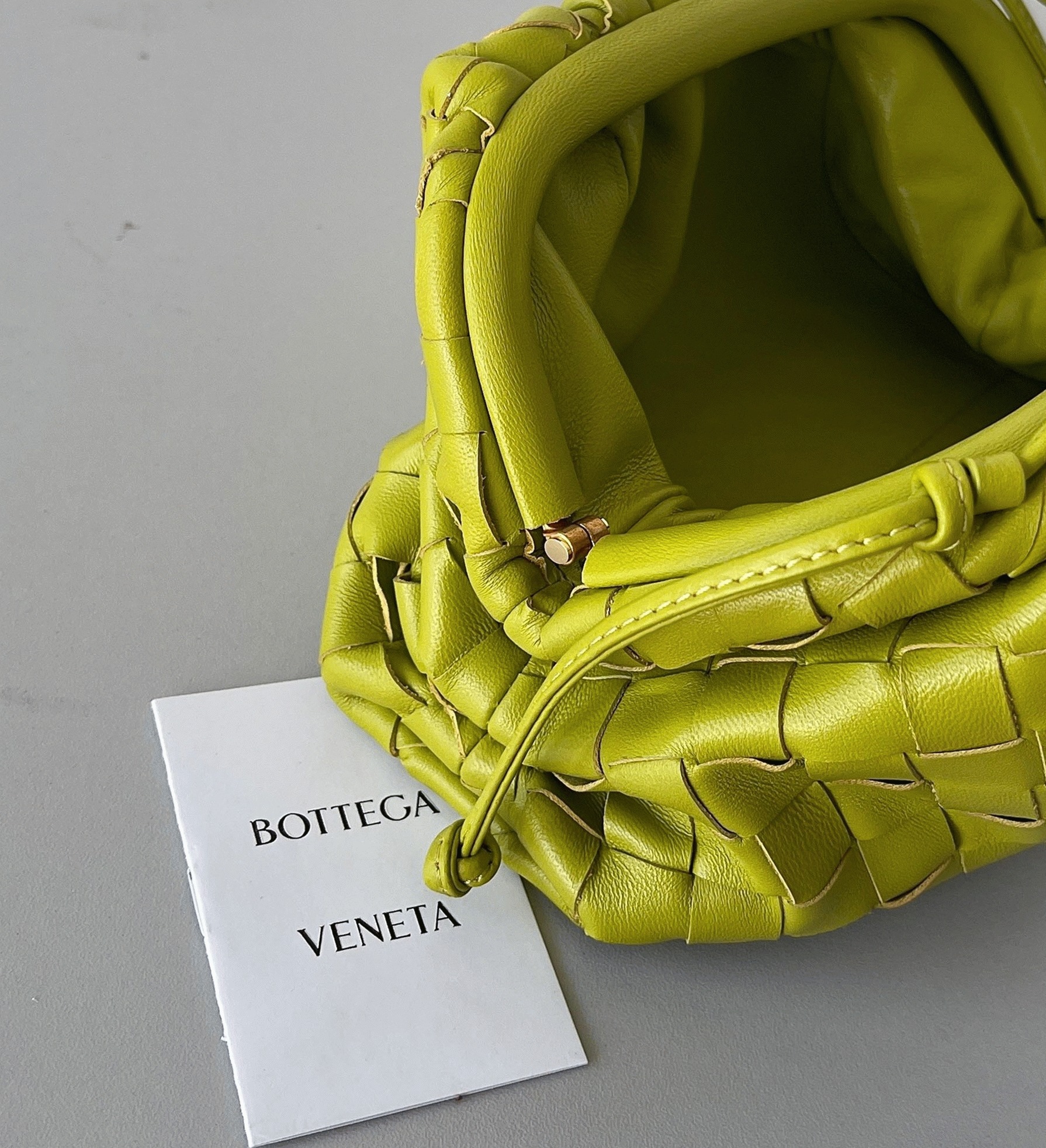 Fake B0tt*ga Ven*ta Mini Pouch with Strap Kiwi