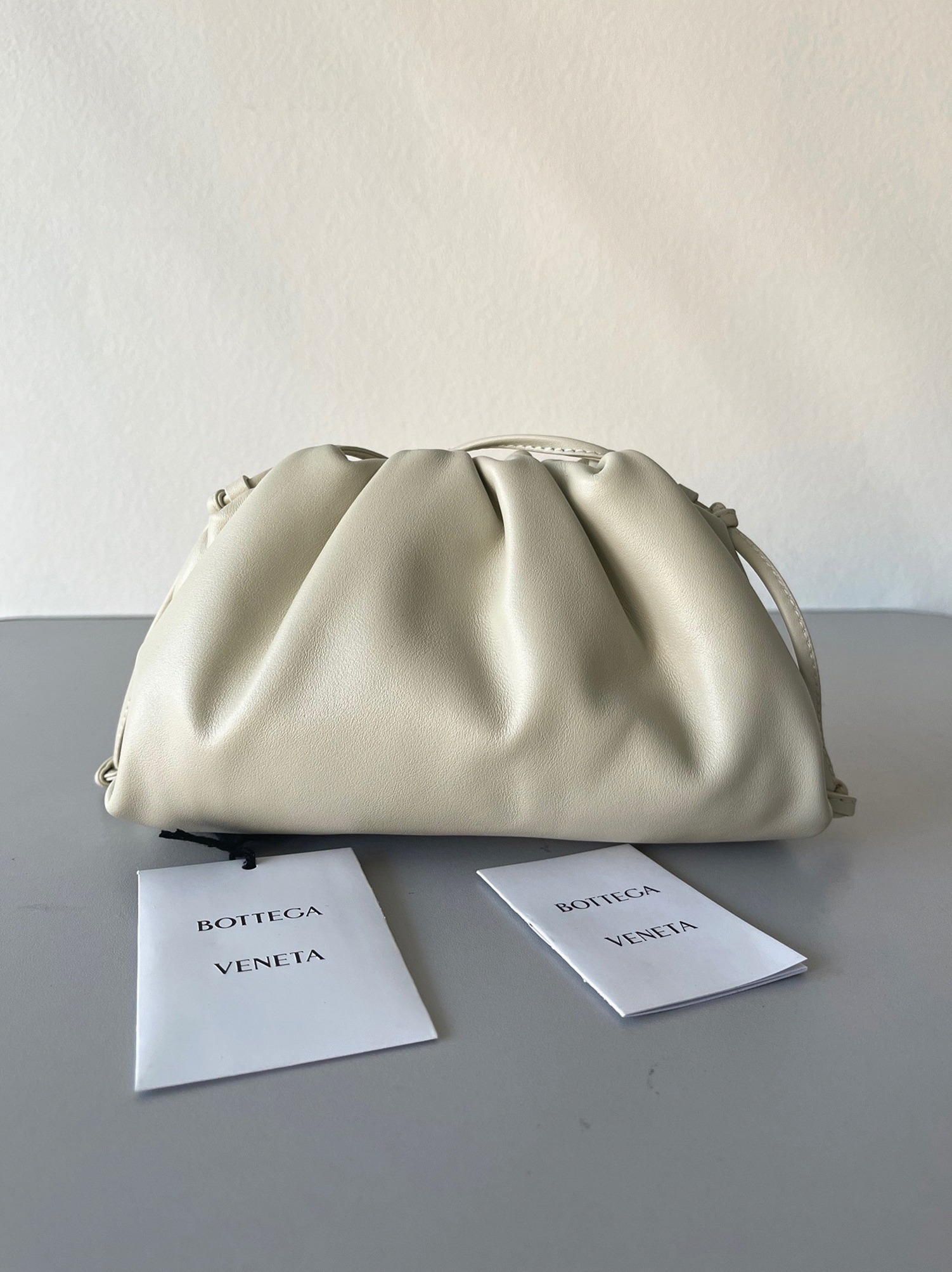 Knockoff B0tt*ga Ven*ta Mini Pouch with Strap Ivory