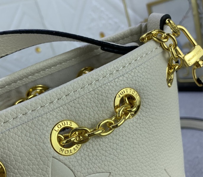 L0vis Vvtt0n Monogram Empreinte Leather Bundle Bag In Cream