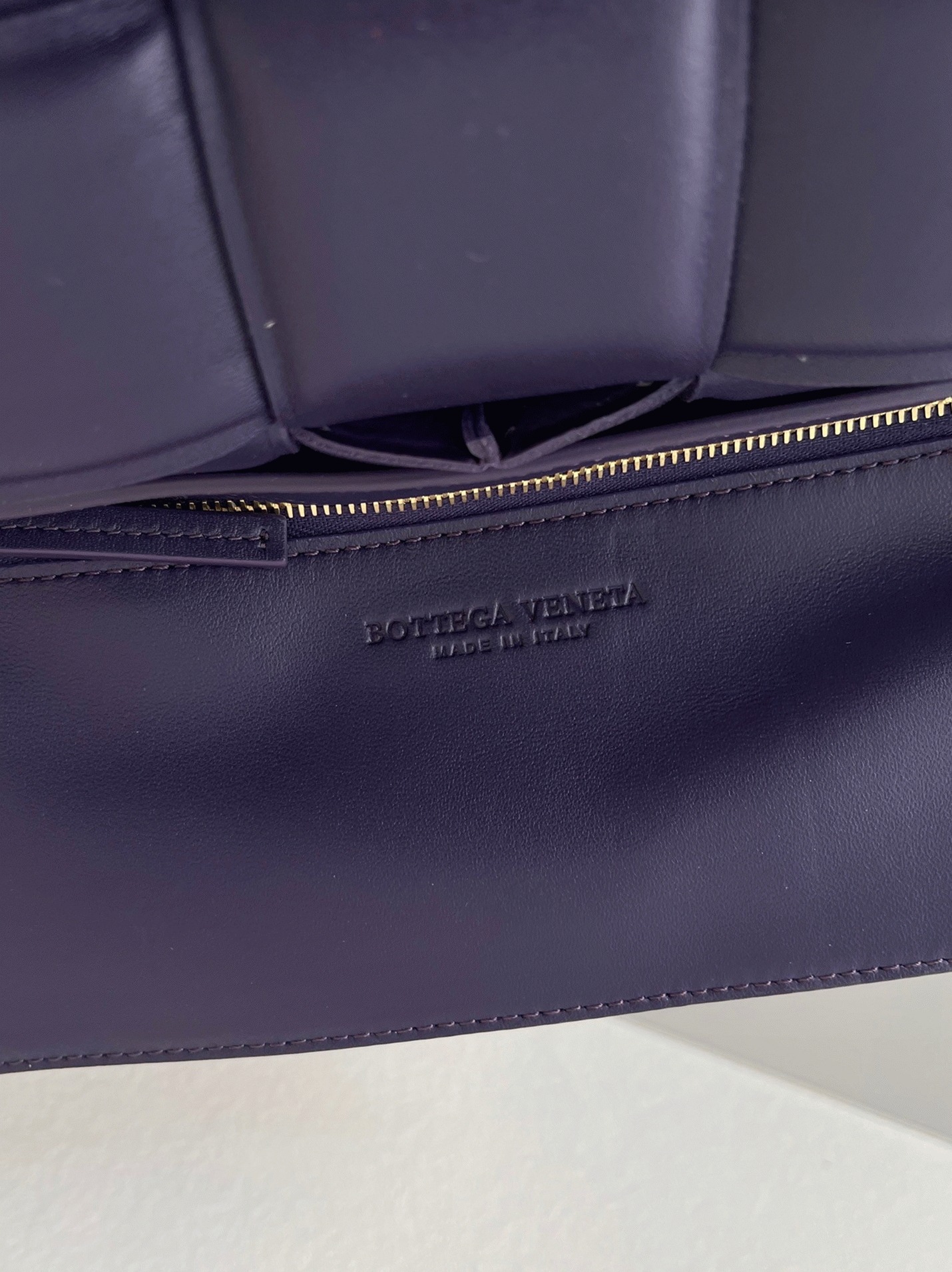 Top Quality Fake B0tt*ga Ven*ta Padded Cassette Bag In Purple