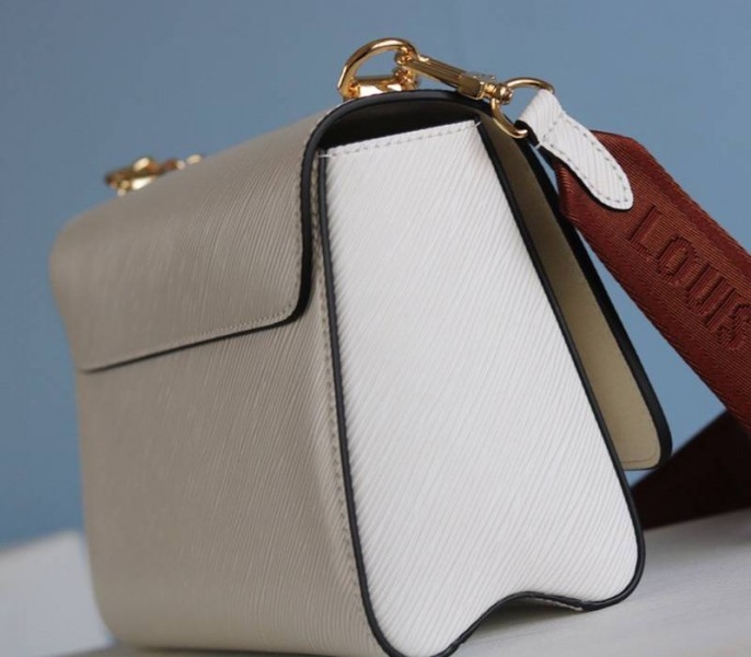 L0vis Vvtt0n Epi Leather Twist MM Bag In Optic White With Jacquard Strap