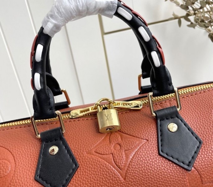 L0vis Vvtt0n Monogram Empreinte Wild At Heart Speedy 25 Bandouliere Handbag In Caramel Brown