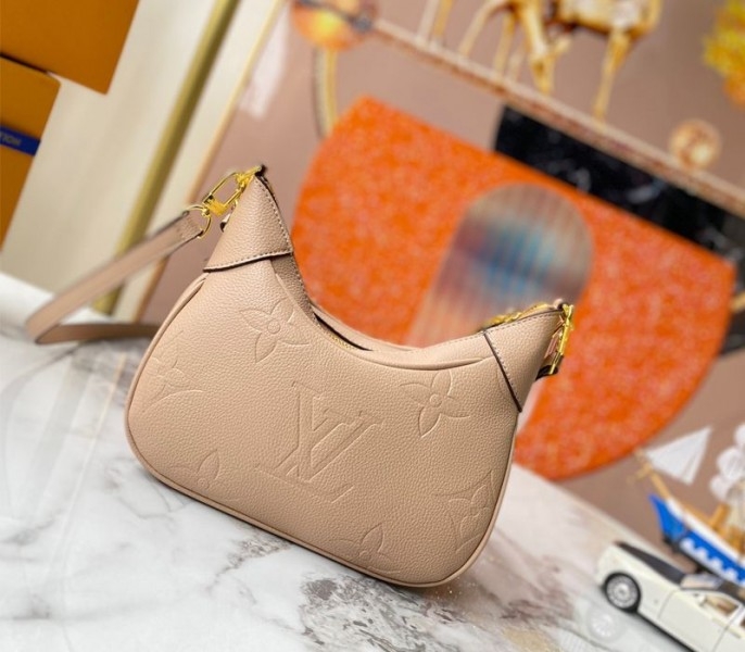 L0vis Vvtt0n Monogram Empreinte Leather Bagatelle Mini Hobo In Beige