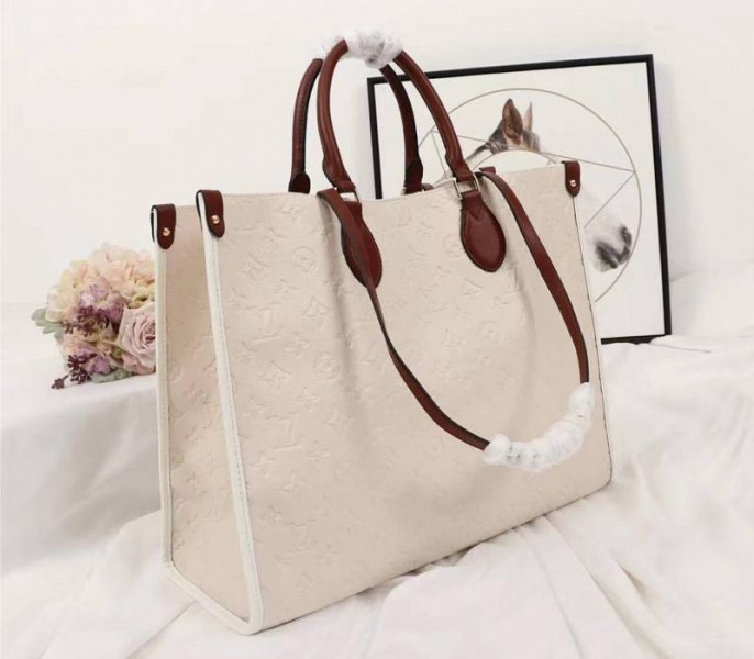 L0vis Vvtt0n Monogram Empreinte Onthego GM Tote In Cream