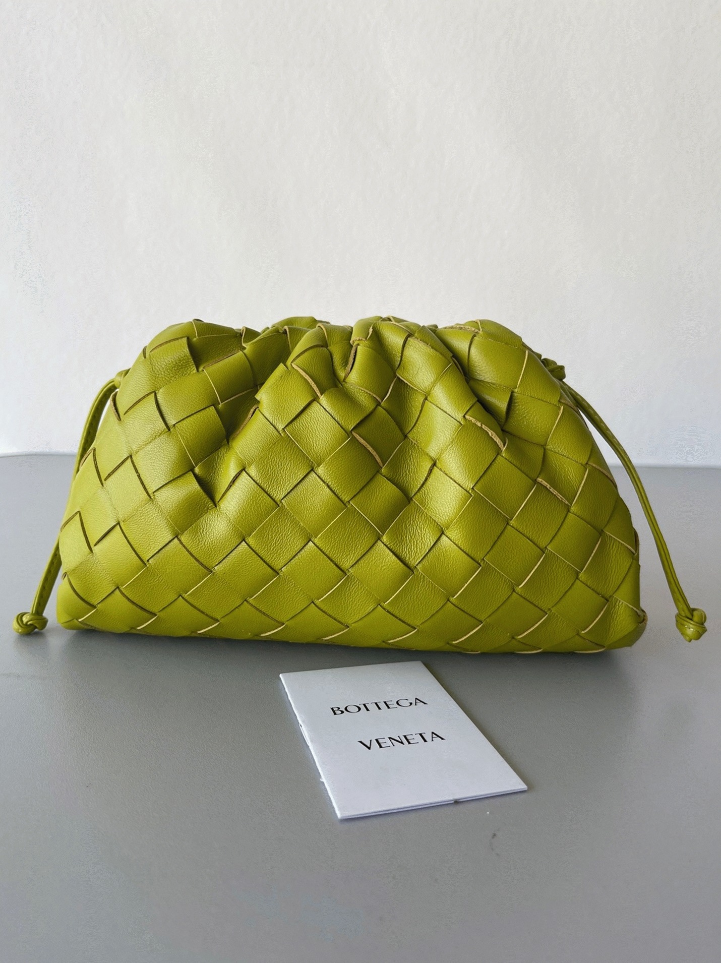 Fake B0tt*ga Ven*ta Mini Pouch with Strap Kiwi