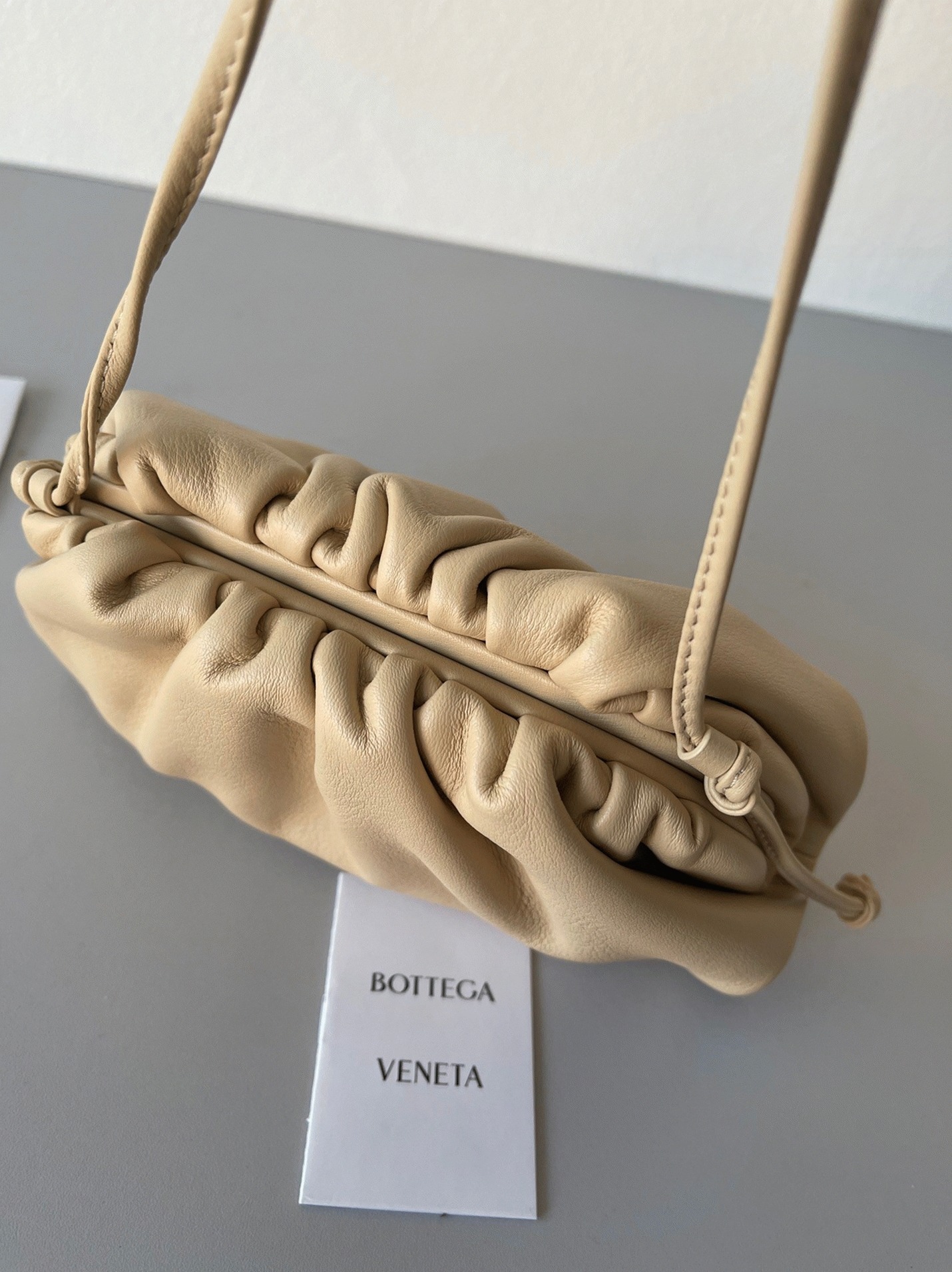 Fake B0tt*ga Ven*ta Mini Pouch with Strap Almond