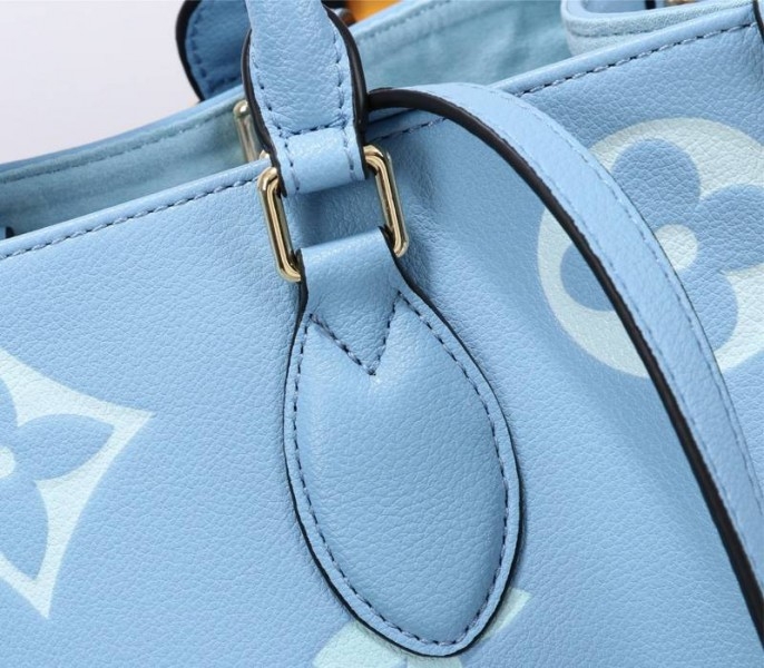 L0vis Vvtt0n Monogram Empreinte Leather Onthego MM Bag In Summer Blue