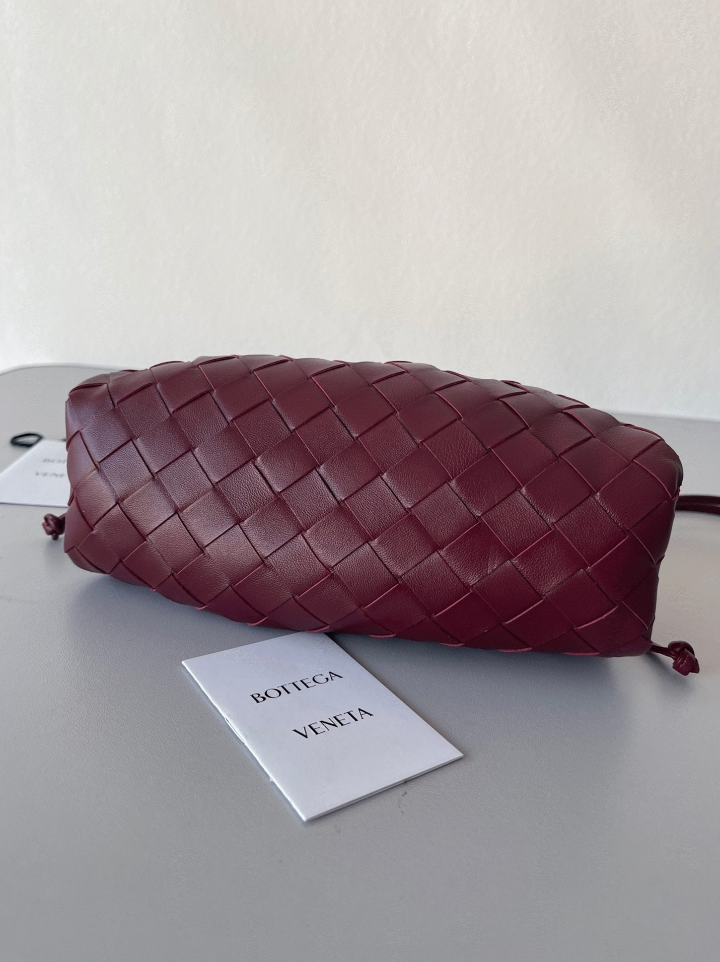 Fake B0tt*ga Ven*ta Mini Pouch with Strap Bordeaux