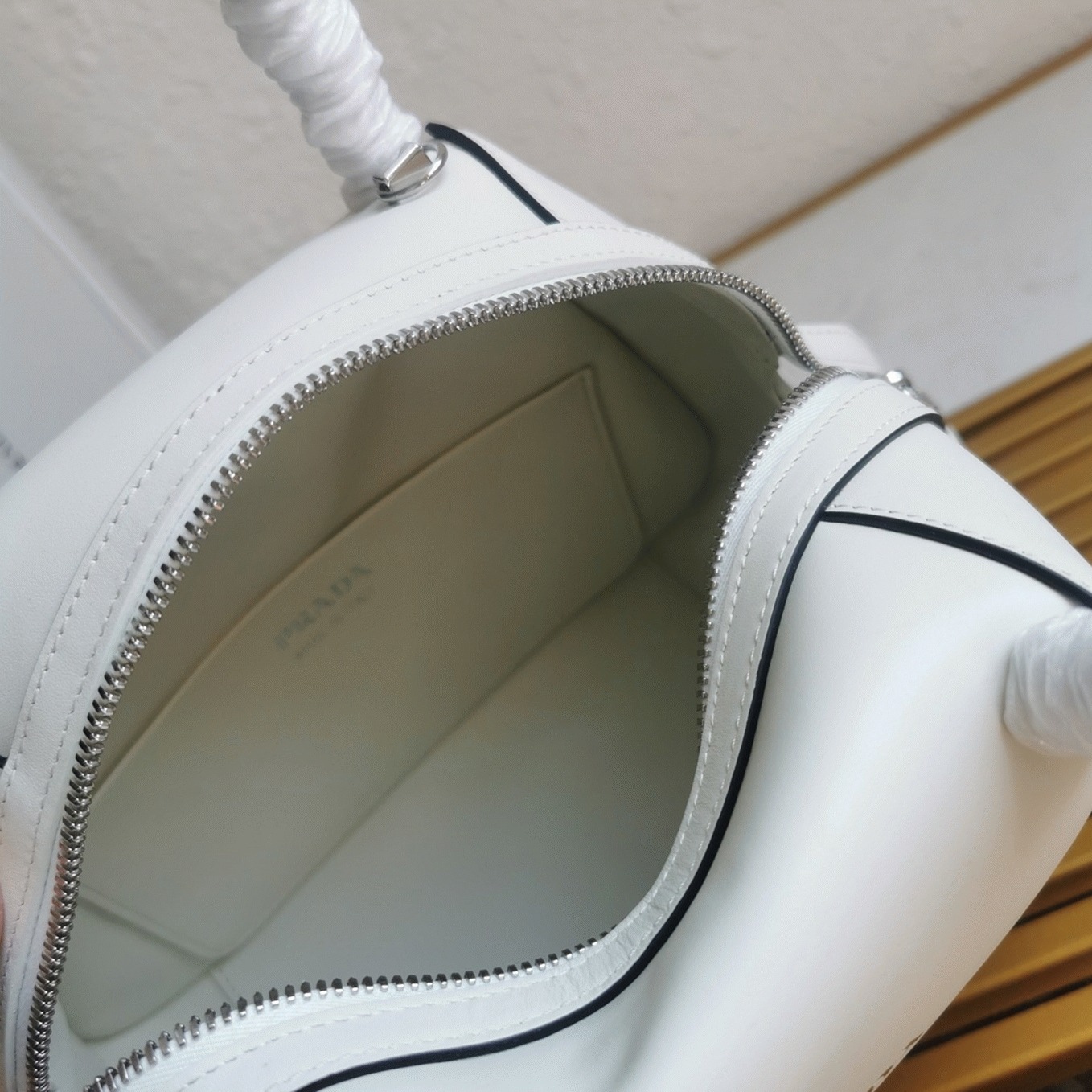 Pra*a S*pernova Small Top Handle Bag Imitation in White