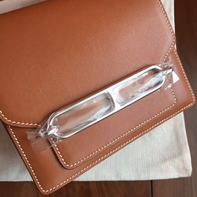 Caramel replica H**me5 Mini Sac Roulis handbag