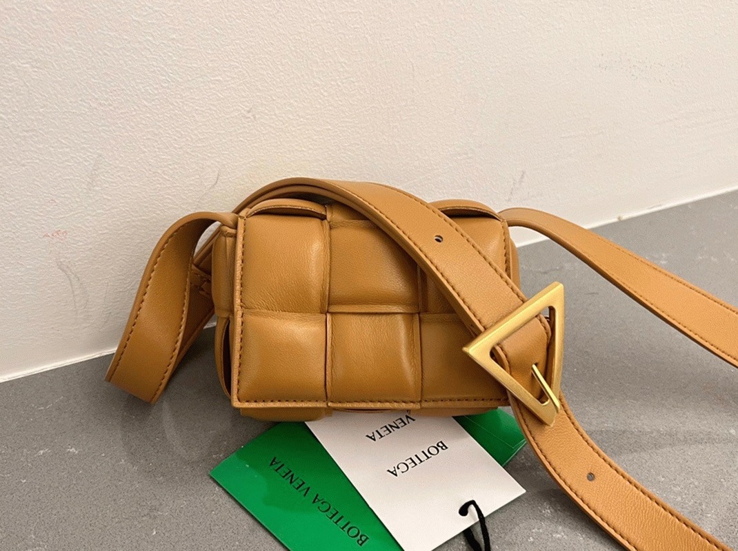 Top Quality Fake B0tt*ga Ven*ta Candy Padded Cassette Bag In Camel