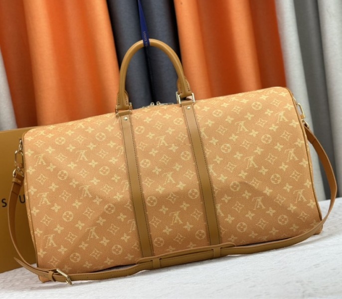 L0vis Vvtt0n Monogram Heritage Canvas Keepall Bandouliere 55 In Yellow