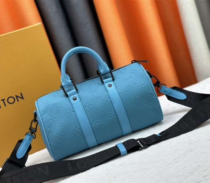 L0vis Vvtt0n Taurillon Monogram Leather Keepall Bandouliere 25 In Turquoise