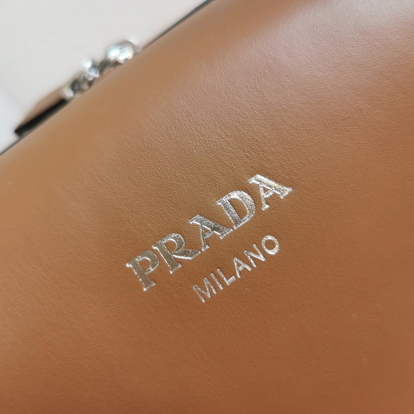Pra*a S*pernova Medium Top Handle Bag Replica in Brown