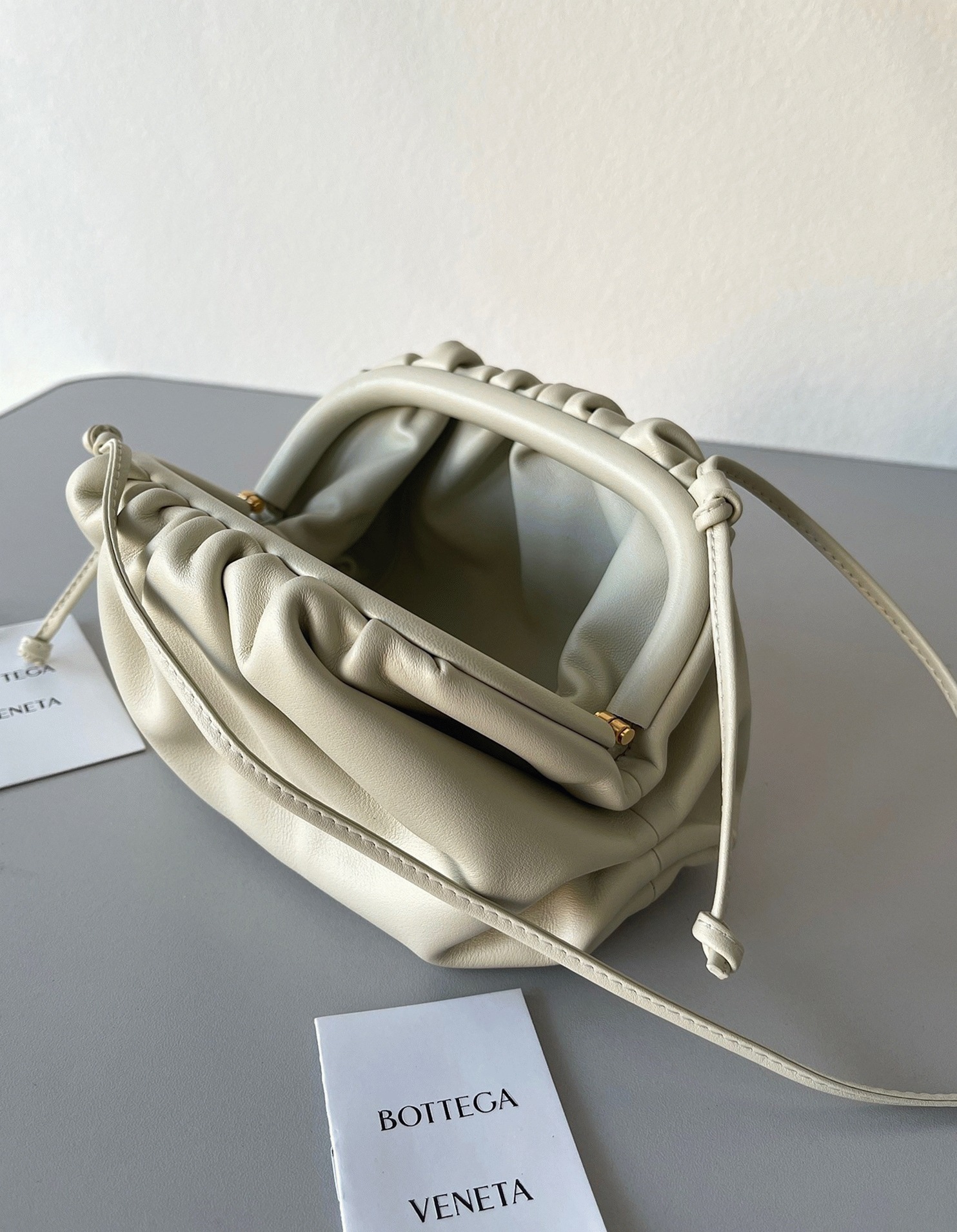 Knockoff B0tt*ga Ven*ta Mini Pouch with Strap Ivory