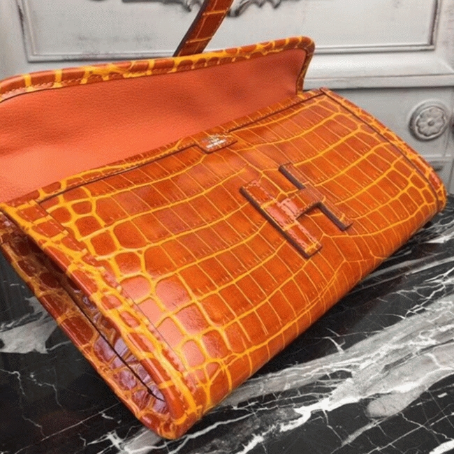Orange crocodile leather knockoff H**me5 Jige Elan clutch bag