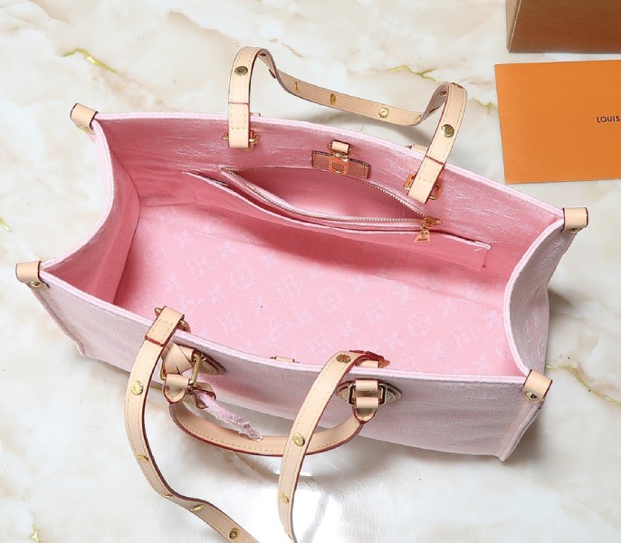 Monogram Denim OnTheGo MM In Washed Pink