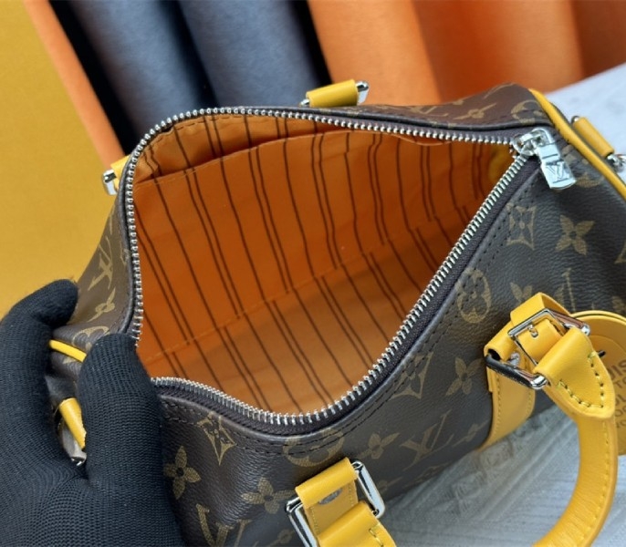 L0vis Vvtt0n Monogram Macassar Canvas Keepall Bandouliere 25 In Safran Yellow