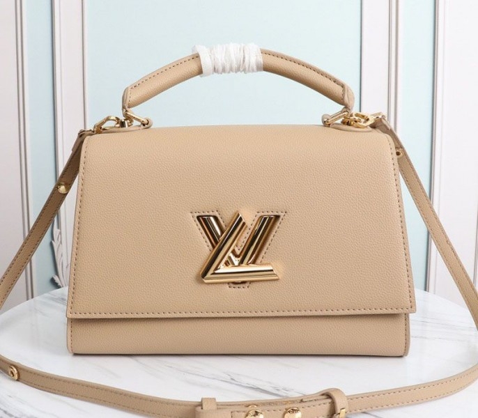 L0vis Vvtt0n Twist One Handle MM Handbag In Beige