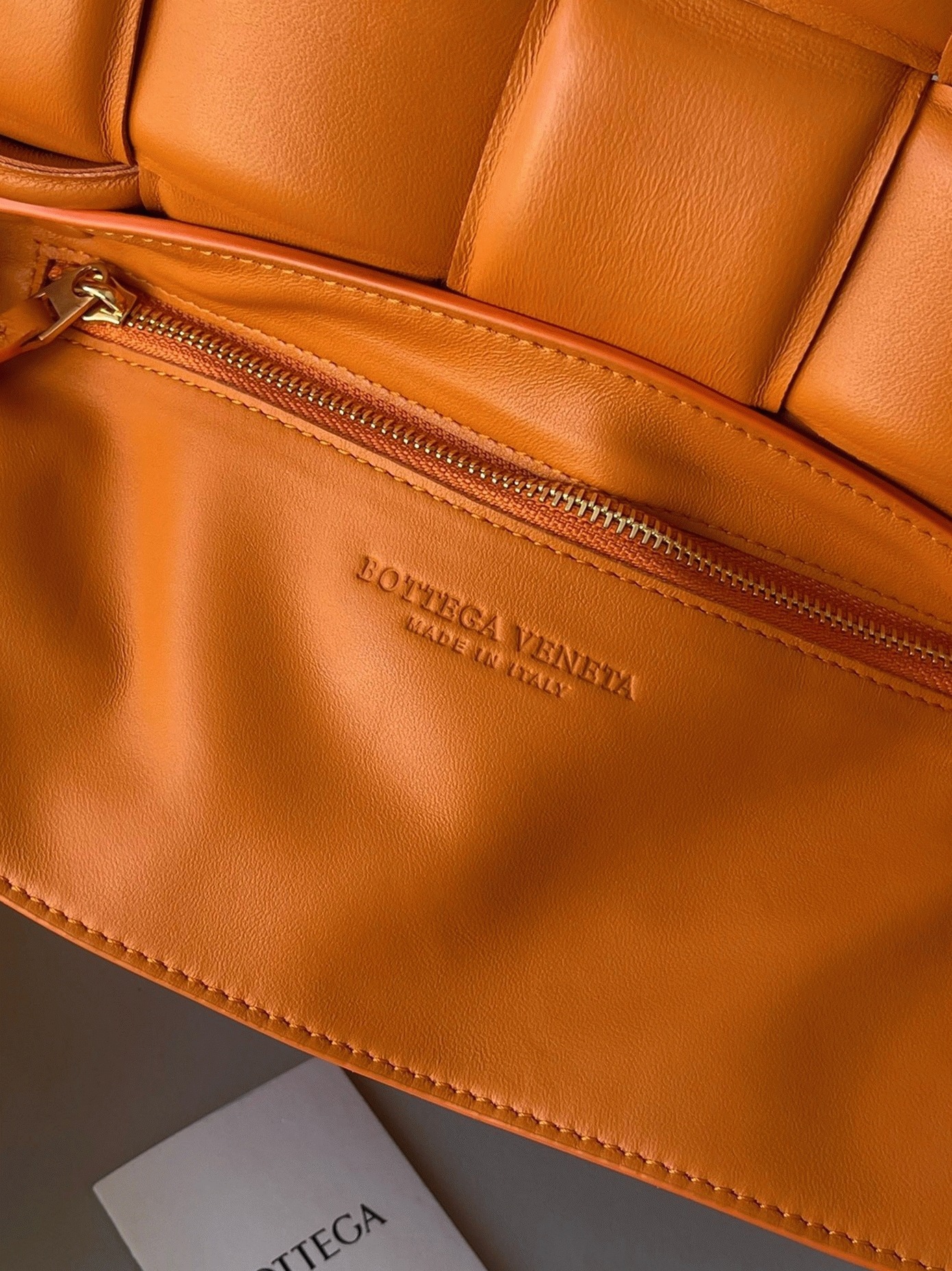 Top Quality Faux B0tt*ga Ven*ta Padded Cassette Bag In Orange