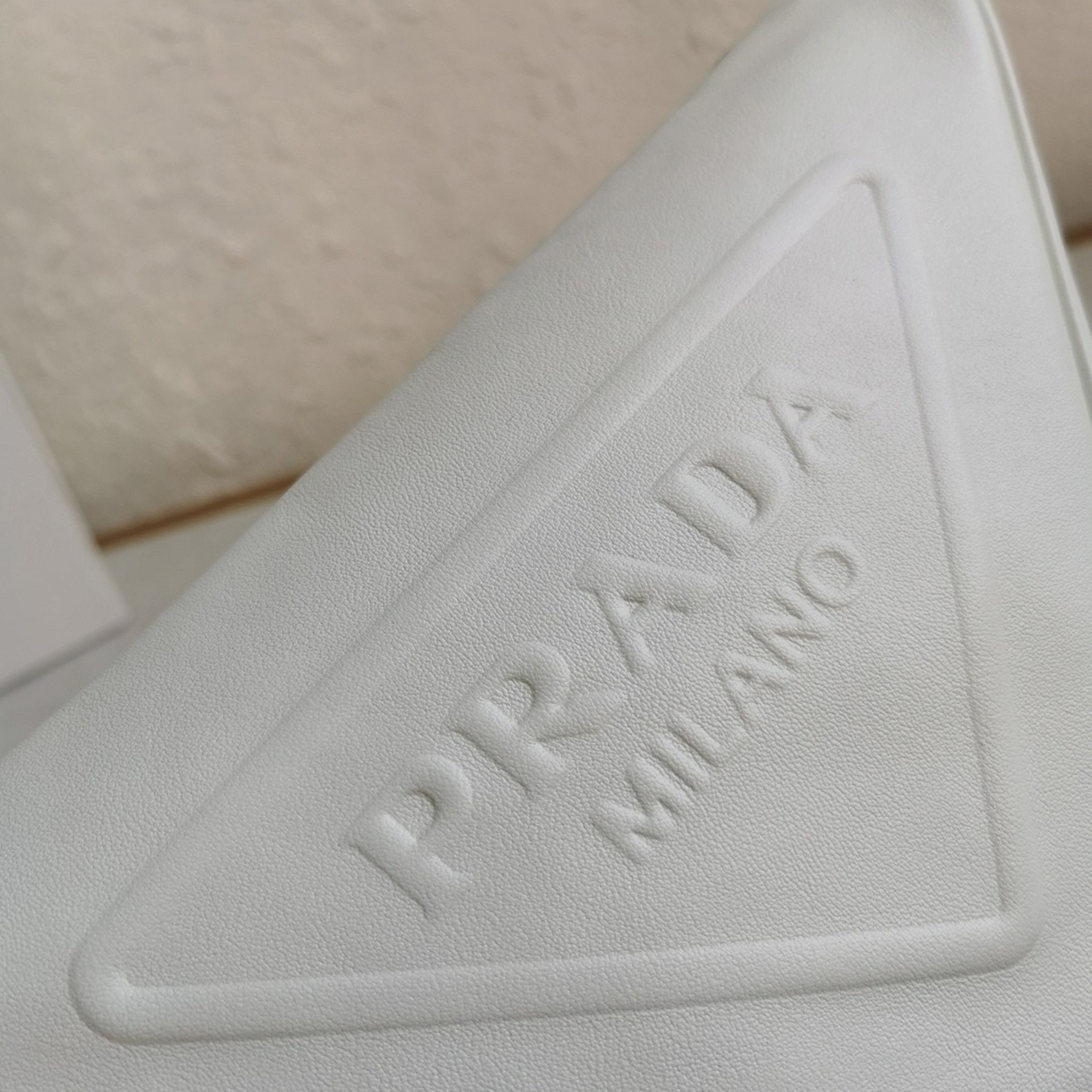 Pra*a Triangle Shoulder Bag Fake in White