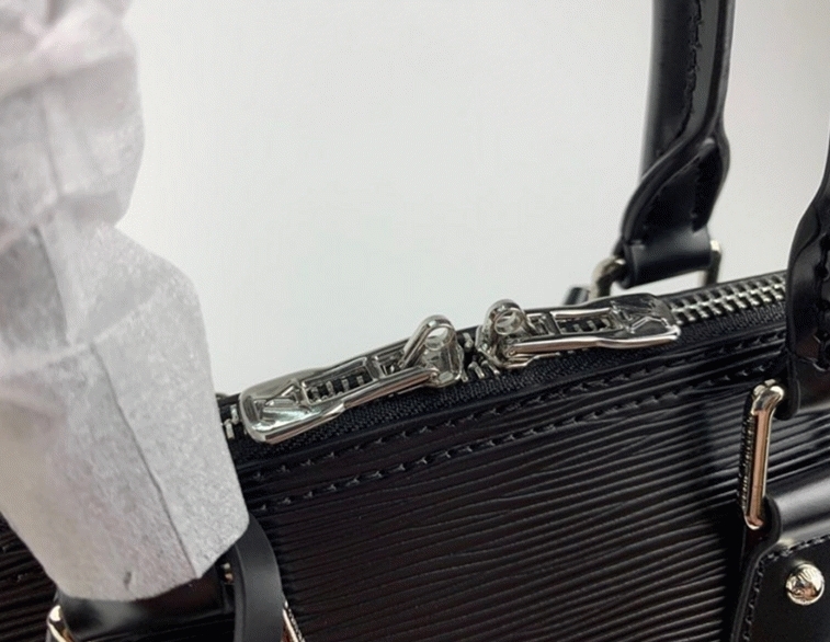 L0vis Vvtt0n Epi Leather Alma PM Jacquard Strap Handbag In Black