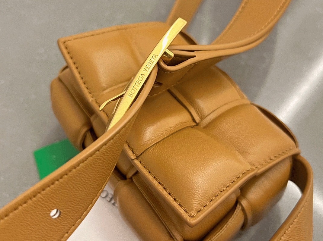 Top Quality Fake B0tt*ga Ven*ta Candy Padded Cassette Bag In Camel