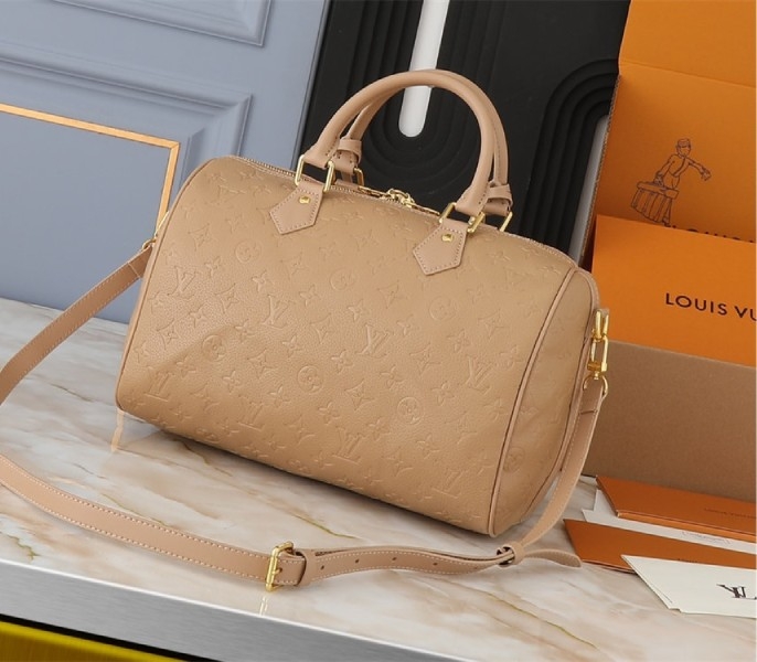L0vis Vvtt0n Monogram Empreinte Speedy Soft 30 Handbag In Apricot