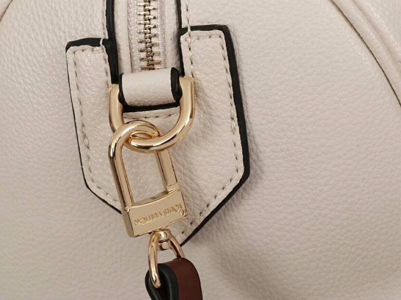 L0vis Vvtt0n Monogram Empreinte Speedy Bandouliere 25 Handbag In Cream