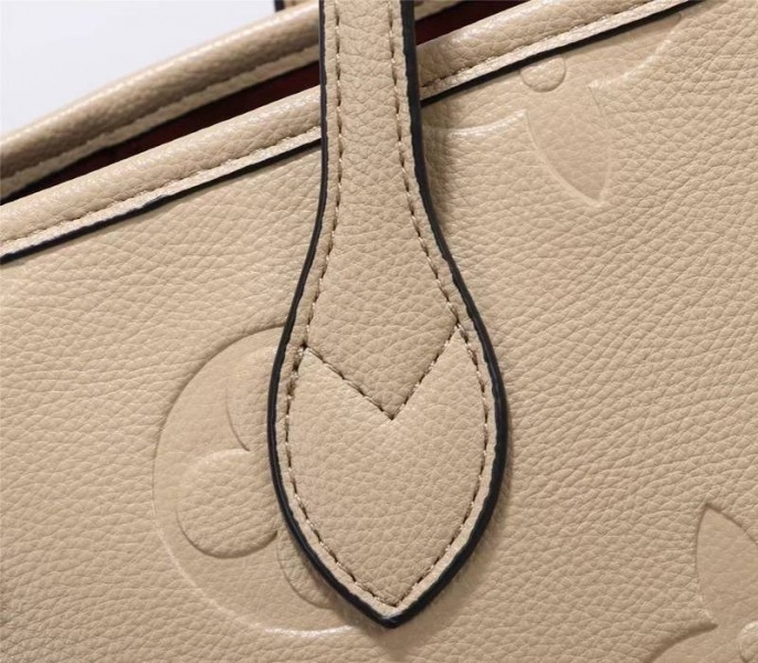 L0vis Vvtt0n Monogram Empreinte Neverfull MM Tote In Beige