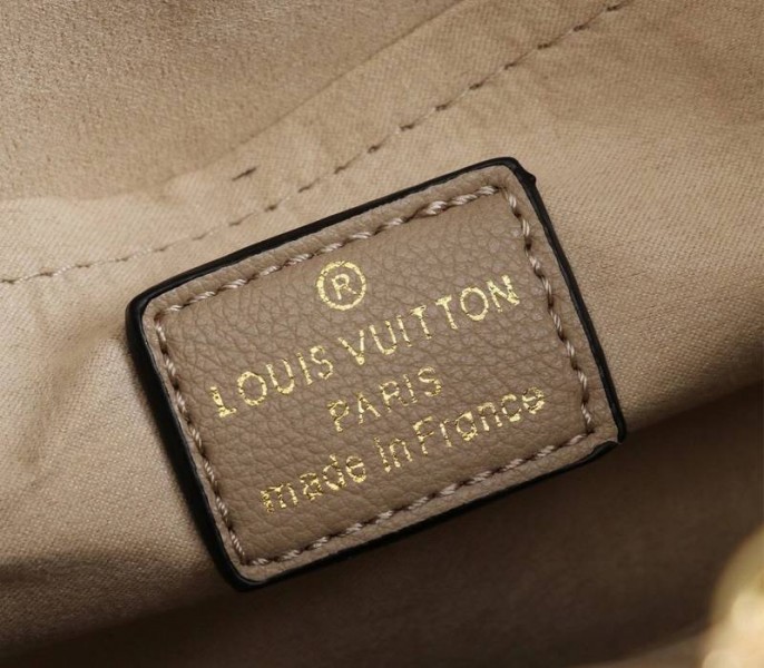L0vis Vvtt0n Monogram Empreinte Montaigne BB In Tourterelle Gray