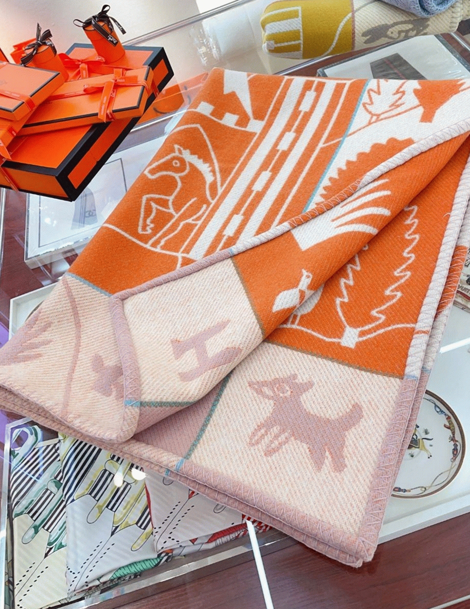 Faux H**me5 Avalon Epopee blanket in mandarine wool and cashmere