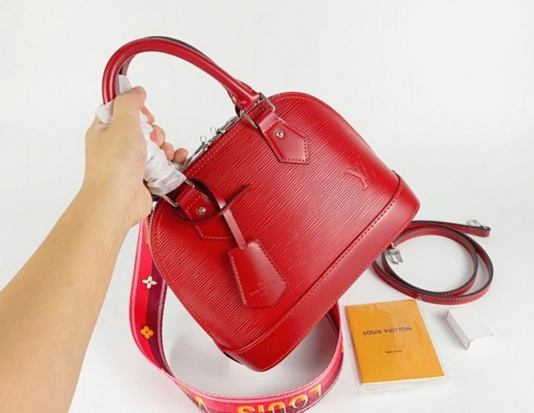 L0vis Vvtt0n Epi Leather Alma BB Handbag In Red With Jacquard Strap