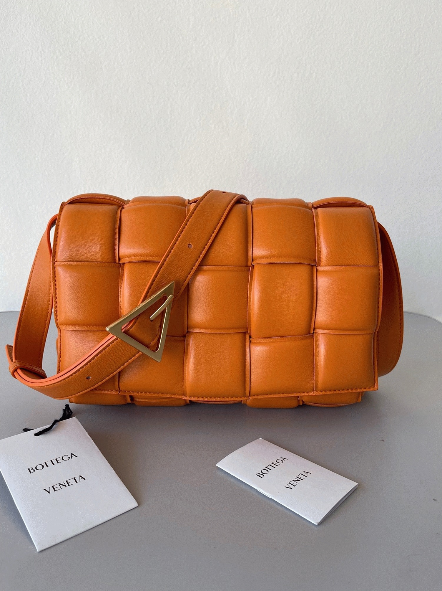 Top Quality Faux B0tt*ga Ven*ta Padded Cassette Bag In Orange