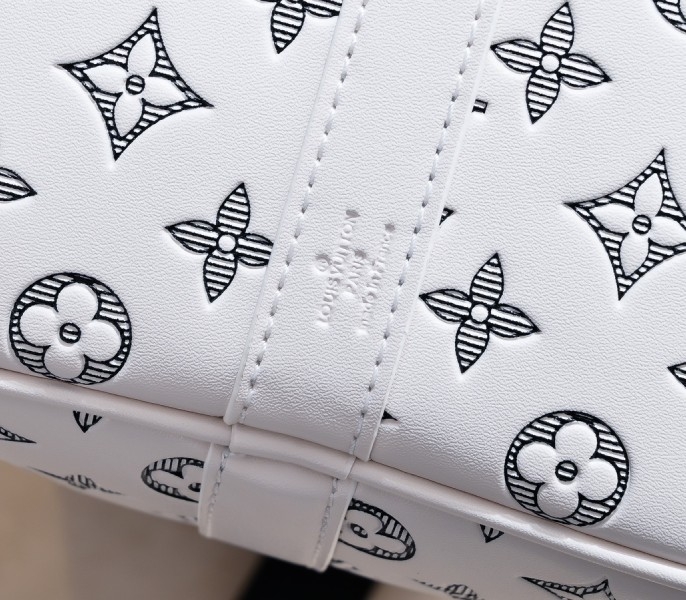 LV Monogram Shadow Keepall Bandouliere 50 In White