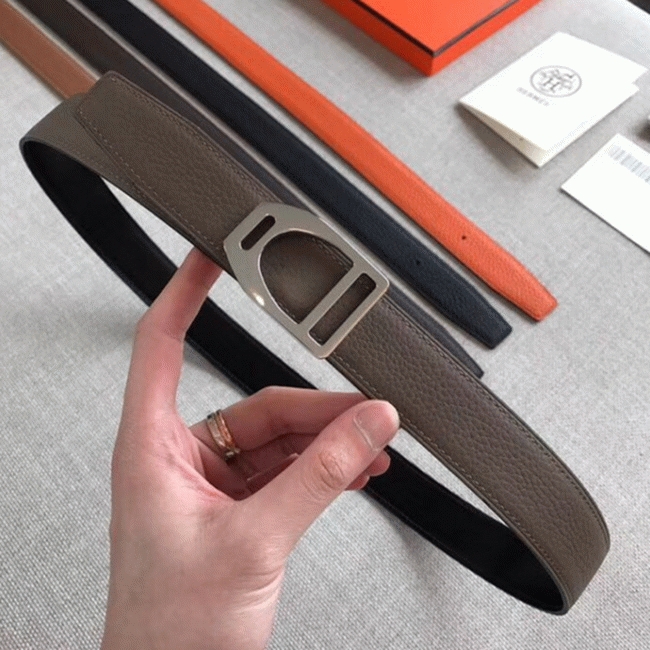 Knockoff H**me5 Etrier buckle belt in taupe shade