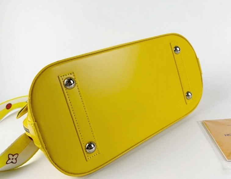 L0vis Vvtt0n Epi Leather Alma PM Handbag In Cedrat Yellow With Jacquard Strap