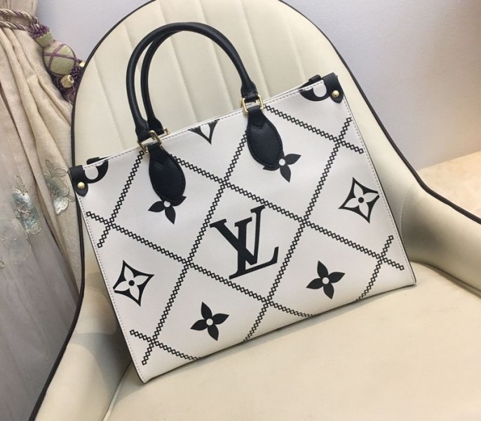 L0vis Vvtt0n Spring 2022 Monogram Empreinte Onthego MM Tote In Cream