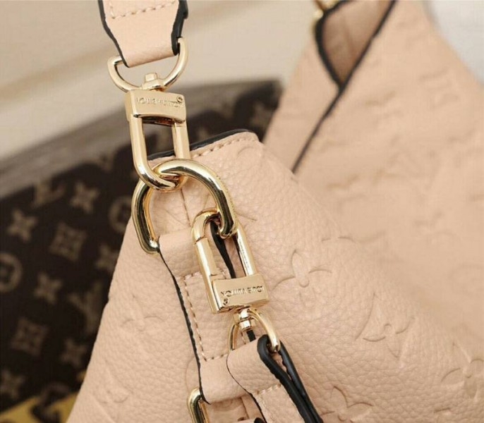 L0vis Vvtt0n Monogram Empreinte Melie Hobo In Beige