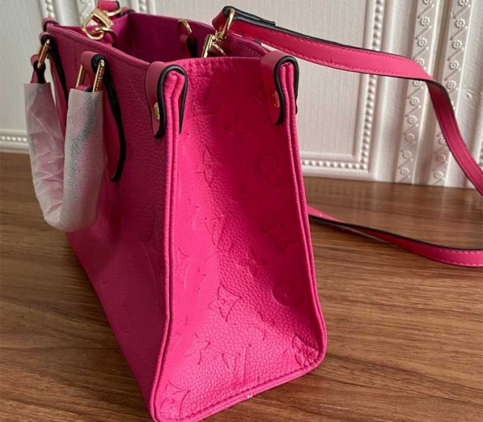 L0vis Vvtt0n Monogram Empreinte Leather Onthego PM Bag In Freesia Pink